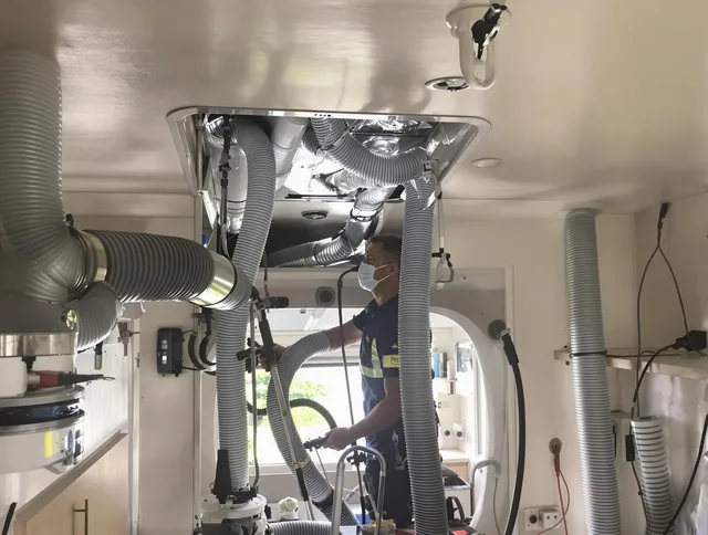 Scituate Air Duct Cleaning specialist performing precise mobile home duct cleaning in Scituate