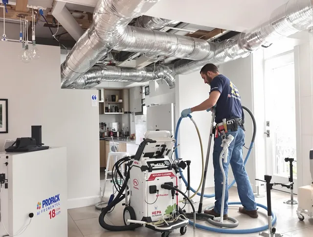 Scituate Air Duct Cleaning technician performing advanced pure duct cleaning with specialized equipment in Scituate